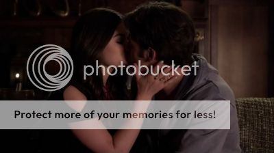Aria and Jake make out on the couch.